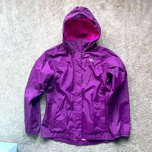 Barely ever worn young girls North face rain jacket.